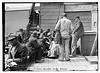 Coal Passers Talk Strike (group on ship's deck) (LOC) by The Library of Congress