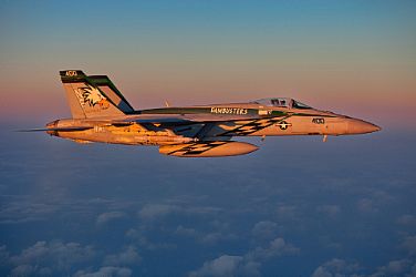 An F/A-18E Super Hornet assigned to the Dambusters of Strike Fighter Squadron (VFA) 195 flies over the East China Sea during exercise Keen Sword 2013. Keen Sword is a biannual exercise held to enable the United States and Japan to train in coordination procedures and heighten interoperability needed to effectively defend Japan or respond to a crisis in the Asia-Pacific region. The U.S. Navy is constantly deployed to preserve peace, protect commerce, and deter aggression through forward presence. Join the conversation on social media using #warfighting.  U.S. Navy photo by Lt. Colin Crawford (Released)  121114-N-ZZ999-480