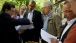 President Obama Talks With Leaders On The Laurel Cabin Patio