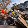 Household items and damages by Superstorm Sandy create piles of trash for homeowners