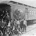 Men standing by Barnum & Bailey Circus railroad car