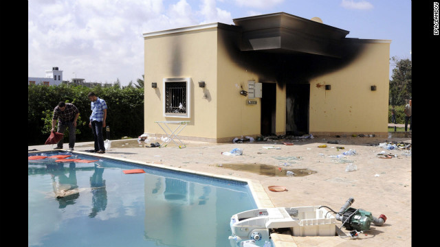 People inspect the damage at the U.S. Consulate in Benghazi, Libya, on Wednesday.