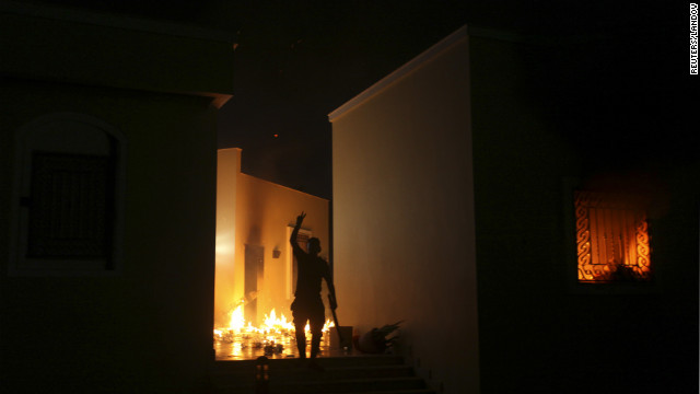 A protester reacts as the U.S. Consulate in Benghazi burns Tuesday night. 