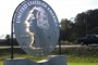 (Christine Dell'Amore/ For The Washington Post ) - A giant quarter, in Everett, Pa., welcomes drivers on the Lincoln Highway.