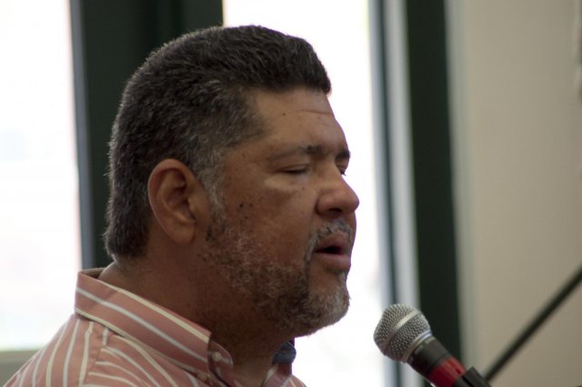 Tony Melendez, a Nicaraguan composer and musician from Chino, Calif., sings and plays guitar with his feet during a weekly Bible study for the Warrior Transition Battalion at the Soldier Family Assistant Center on Sept. 12, 2012.  Melendez, a musician born without arms, performed with the Toe Jam Band.