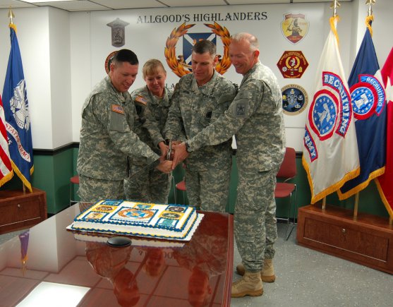 Sgt. Maj. Manuel Atencio, Medical Recruiting Brigade Command  Sergeant Major, Col. Karrie Fristoe, brigade commander, Maj. Gen. David L. Mann, Commanding General, U. S. Army Recruiting Command, and Command Sgt. Maj. Todd Moore, USAREC, cut the Medical Recruiting Brigade's anniversary cake Oct. 2, 2012.