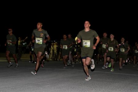 Deployed runners push bodies, complete marathon overseas