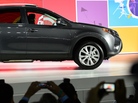 Toyota unveils its new RAV4 crossover SUV to the media Wednesday before the L.A. Auto Show opens to the public.