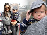 A new cap on her Christmas list... Flynn Bloom was seen on Thursday in New York with his mother Miranda Kerr wearing his favourite grey baseball hat