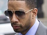 Facing defeat: Ryan Leslie is pictured entering Federal Court in Manhattan, on Wednesday morning before a judge ruled in favor of German auto shop owner Armin Augstein