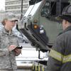 Soldier interviews FDNY firefighter [Image 3 of 5]