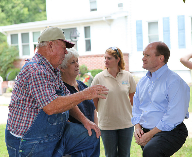 Sen. Coons talking to farmer about USDA conservation efforts