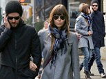 Coupled up: Jessica Biel and Justin Timberlake stroll arm-in-arm in New York City on Tuesday