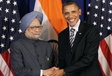 U.S. President Barack Obama shakes with Indian Prime Minister Manmohan Singh on the sidelines of the ASEAN Summit in Nusa Dua, Bali, November 18, 2011. REUTERS/Jason Reed