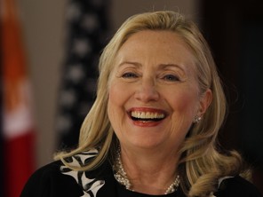 U.S. Secretary of State Hillary Rodham Clinton reacts to a personal question from the audience during her townhall meeting and interview with Filipino scholars in Manila, Philippines Wednesday Nov. 16, 2011. Clinton is here for the 60th anniversary of the Mutual Defense Treaty signed between the two countries and in her speech, underlined America's military and diplomatic support for the Philippines as the island nation engages in an increasingly tense dispute with China over claims in the resource-rich South China Sea. (AP Photo/Bullit Marquez)