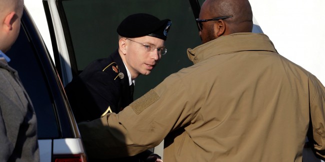 Army Pfc. Bradley Manning steps out of a security vehicle as he is escorted into a courthouse in Fort Meade, Md., Thursday, Nov. 29, 2012, for a pretrial hearing. Photo: Patrick Semansky/AP