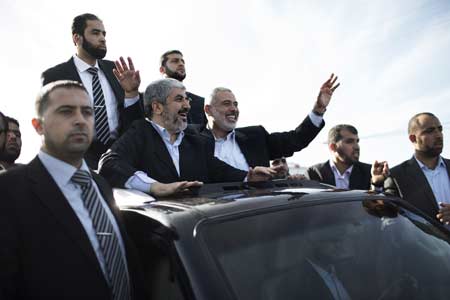 Hamas chief kisses Gaza soil on first visit