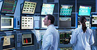 TechBiz  / Image: Scientists monitoring computers in control room © Martin Barraud/OJO Images/Getty Images