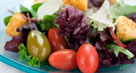 Green salad with tomatoes (© Kelly Cline/Getty Images)