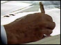President Reagan's hand signs INF treaty