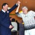 Airman dancing with senior citizen