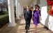 President And Mrs. Obama Walk Along The Colonnade