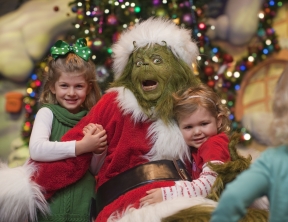 The Grinch is just one of many characters amid all the attractions in the Macy's Parade at Universal.