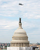 Shuttle Discovery flying past the U.S. Capitol Dome by USCapitol