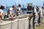 Louisiana Guard rushes to protect city from flood waters