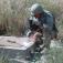 Sgt. Jay Feltman fabricates a manhole cover