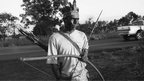 A Guarani Kaiowá warrior receives representatives of the Human Rights Secretariat of the Presidency, the former Orange camp at Highway 163.