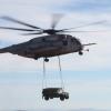 Wolfpack howls with Marines on ground during external lift [Image 2 of 4]