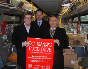 Ambassador Jacobson, Ottawa mayor Jim Watson and OC Transpo General Manager John Manconi at the OC Transpo/Loblaw's Annual Christmas Food Drive. (Credit: US Embassy Ottawa) 