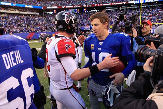 The last time Matt Ryan saw Eli Manning, he was congratulating him for a playoff win. (Getty Images)