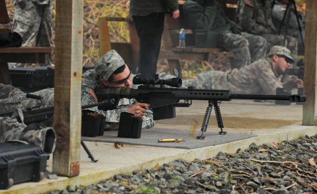 ROY, Wash." Sgt. Ruben C. Lugo, explosive ordnance disposal sergeant, Bravo Company, 110th Chemical Battalion (Technical Escort) from Joint Base Lewis-McChord,  fires the Barrett M107 .50 caliber sniper rifle, Feb. 24, during a familiarization range at the Pierce County Sheriff's Department Range in Roy, Wash. (U.S. Army photo by Sgt. Ashley M. Outler, 28th Public Affairs Detachment)