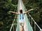 Photo: A young girl crosses a bridge in Costa Rica