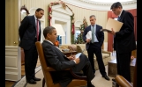 President Obama Works With Senior Advisors In The Oval Office