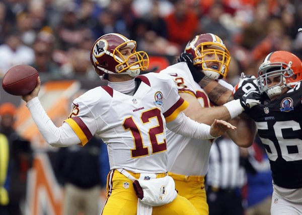 Washington quarterback Kirk Cousins threw for 329 yards, two touchdowns and an interception against the Cleveland Browns on Sunday.