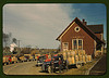 Trucks outside of a starch factory, Caribou, Aroostook County, Me. There were almost fifty trucks in the line. Some had been waiting for twenty-four hours for the potatoes to be graded and weighed (LOC) by The Library of Congress