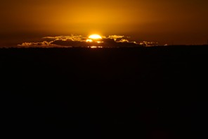 This picture shows the sunset from Cisternino, in the southern Italian region of Puglia on December 11, 2012.  Cisternino is one of the few places on earth believed to be spared when the world ends, which according to the ancient Mayan calendar should take place on December 21, 2012. AFP PHOTO / GIUSEPPE CACACE        (Photo credit should read GIUSEPPE CACACE/AFP/Getty Images)