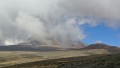 Gazing across "The Saddle" of Mt. Kilimanjaro towards the peak, cloaked in cloud cover. The Marangu Route takes 5-6 days to climb. (Photo by Andrew Evans, National Geographic Traveler)