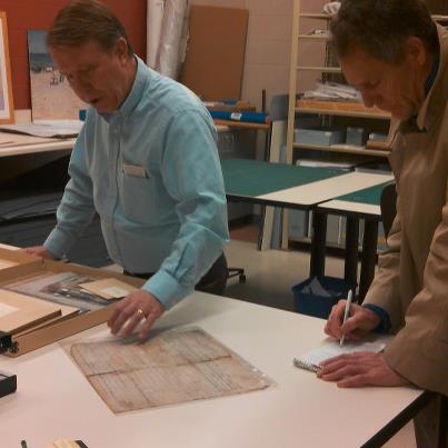 Photo: Indy Star's Will Higgins checks out some Lincoln artifacts being prepared for Feb. 9, 2013 exhibition. Watch for his story...