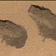 This is a view of the third (left) and fourth (right) trenches made by the 1.6-inch-wide (4-centimeter-wide) scoop on NASA's Mars rover Curiosity in October 2012 and shows some of the details regarding the properties of the 'Rocknest' wind drift sand.