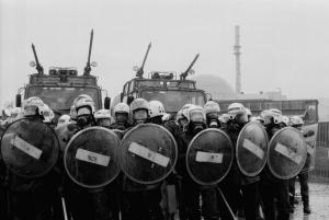 Police stand guard outside the Brokdorf Nuclear Power Plant in 1981. Photo credit: Günter Zint/panfoto.de