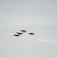 Blue Angels 1 and 4 fly inverted over Baltimore Harbor off of historic Fort McHenry