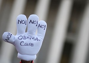 WASHINGTON, DC - MARCH 27:  A anti Obama healt...