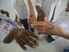 Young visitors to the NASA aeronautics exhibit at the Joint Services Open House and Air Show in May near Washington, D.C., display their new body art.