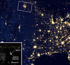 Satellite view of US at night showing North Dakota, home to shale gas, is aglow at night