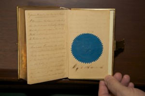 Alternate view of the 1861 Lincoln Inaugural Bible, opened to the page signed by the clerk of the Supreme Court, William Thomas Carroll, attesting that the book was used for Lincoln's oath of office