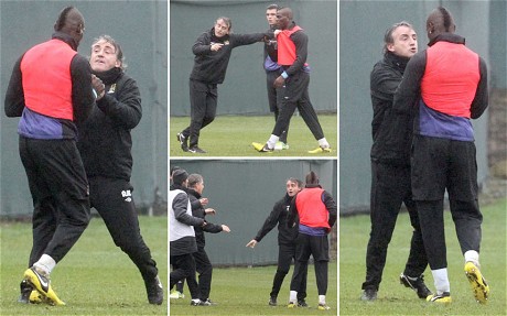 Mario Balotelli and Roberto Mancini come to blows following a mis-timed tackle by the striker on Scott Sinclair during training. 